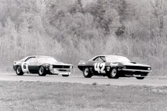 Mark Donahue between Swede Savage and Dan Gurney