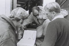 Swede Savage,Dan Gurney and Bob Tarrozi discussing the track.