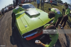 LEXINGTON, OH - JUNE 7: Crew members polish the Autodynamics Dodge Challenger that Sam Posey will drive in the Mid-Oho Trans-Am on June 7, 1970 at Lexington, Ohio. (Photo by Alvis Upitis/Getty Images)